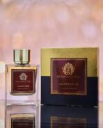 Amber Oud by Ministry of Oud luxury perfume bottle on Arabian-themed background