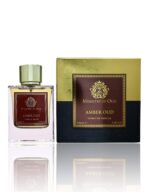 Amber Oud by Ministry of Oud luxury perfume bottle on Arabian-themed background