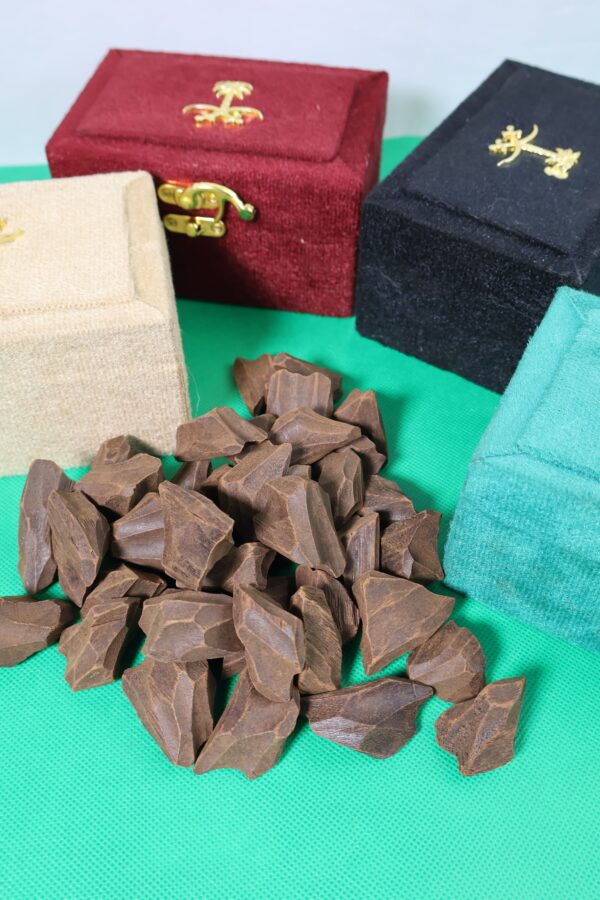Dark‑brown resin-rich Indonesian BM Oud chunk for burning, top-grade agarwood.