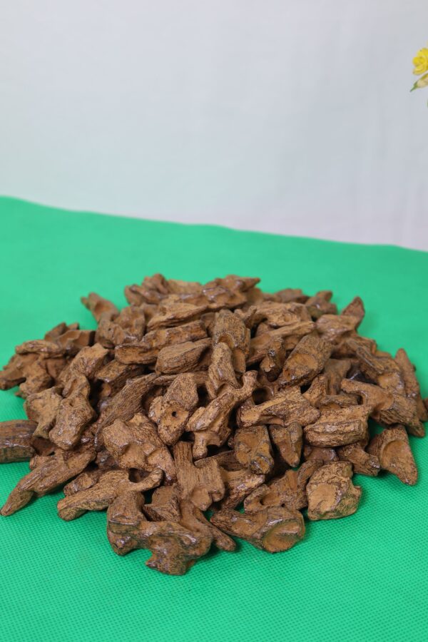Dark brown resin-saturated Indonesian Kalimantan oud chunk – premium agarwood for burning.”