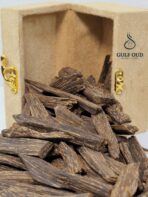 Resin‑dense Malaysian Mohassan AA oud chunk – premium agarwood for burning, dark-brown rich texture.